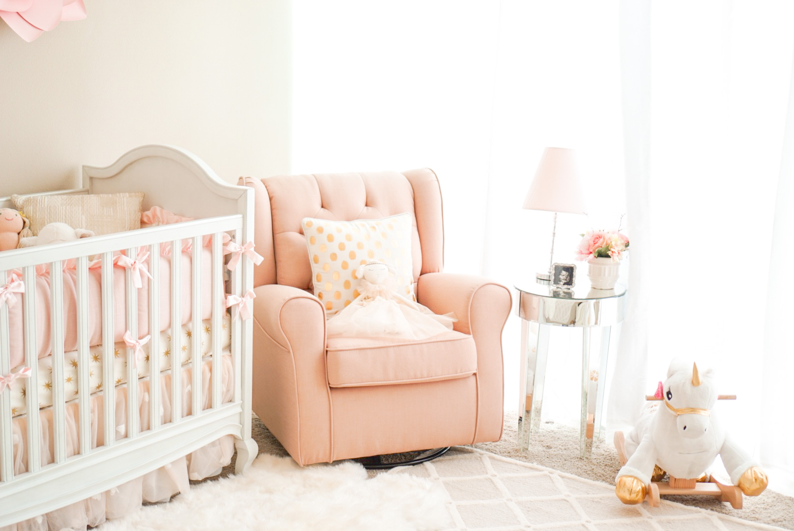 blush nursery glider