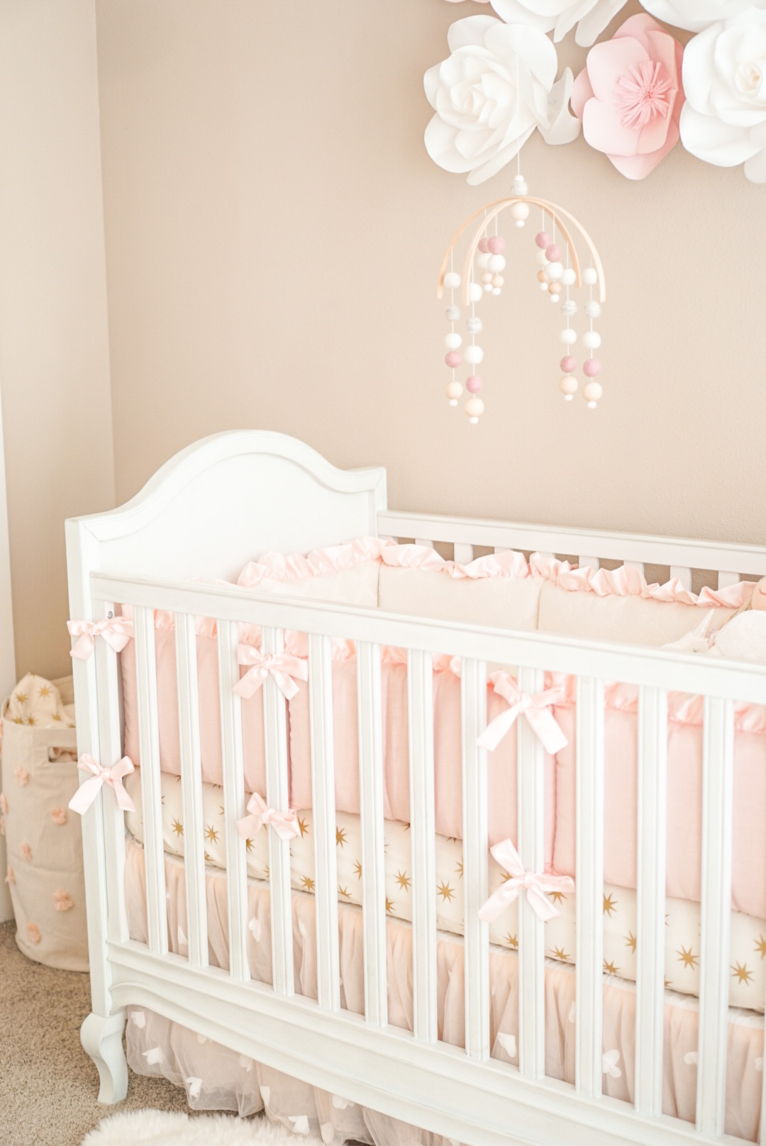 Blogger Katelyn Jones A Touch of Pink Pretty Nursery Pottery Barn Crib