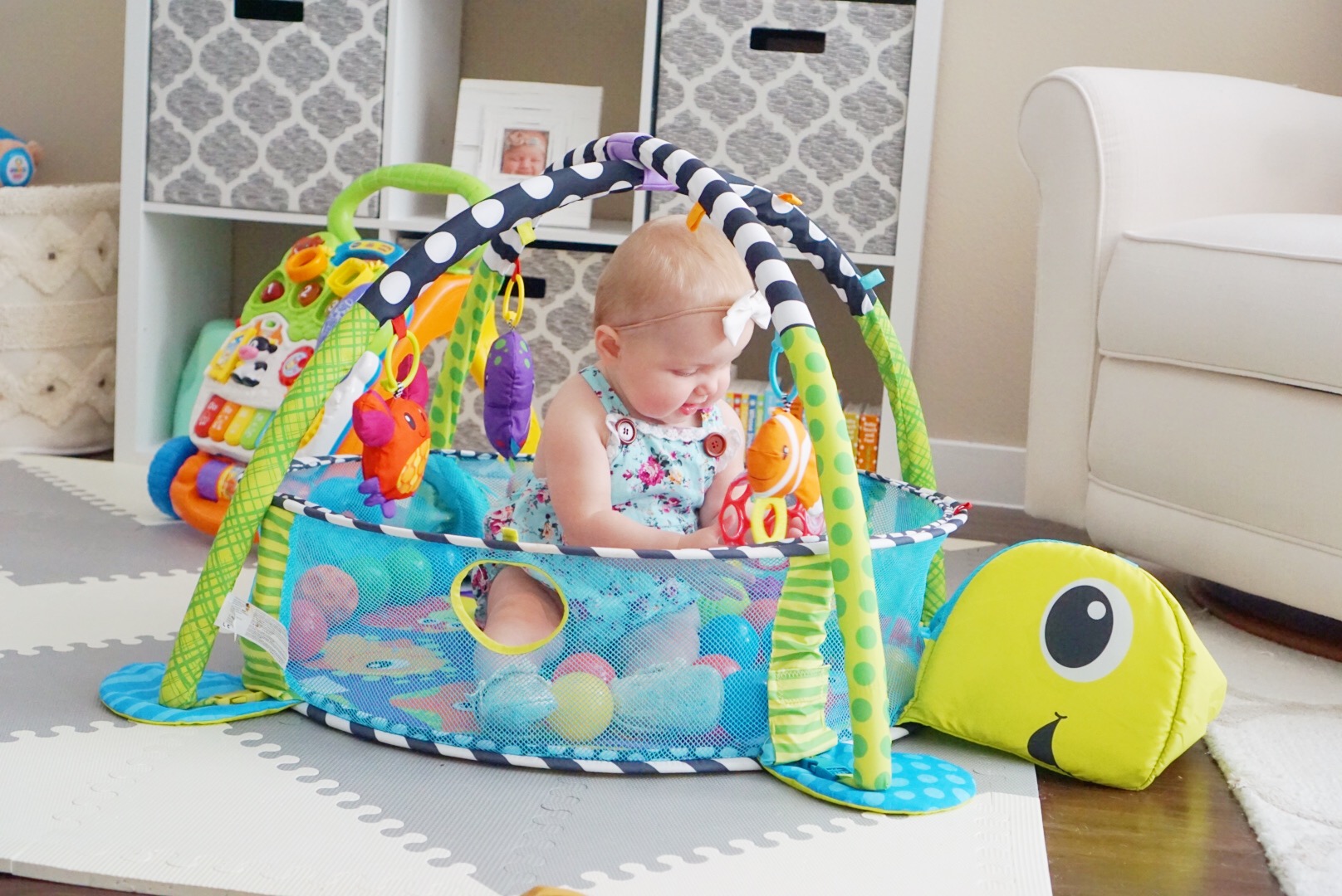 Katelyn Jones A Touch of Pink buybuy BABY The Infantino Grow-With-Me Activity Gym