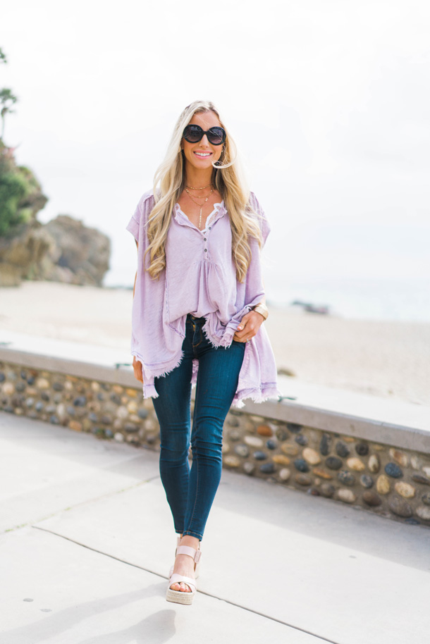 Lifestyle blogger Katelyn Jones of A Touch Of Pink wears a Free People Aster Henley with skinny jeans