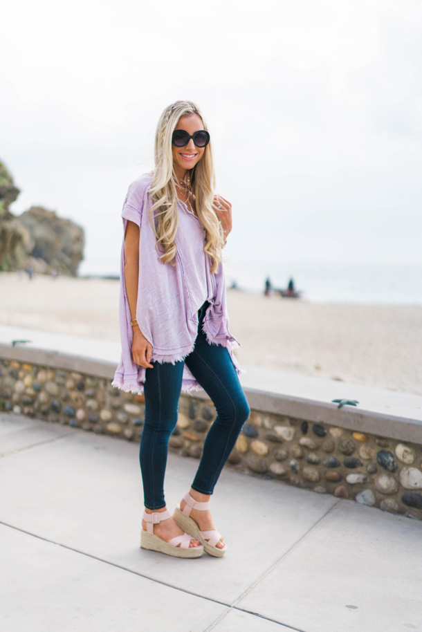 Lifestyle blogger Katelyn Jones of A Touch Of Pink wears round retro Prada sunglasses