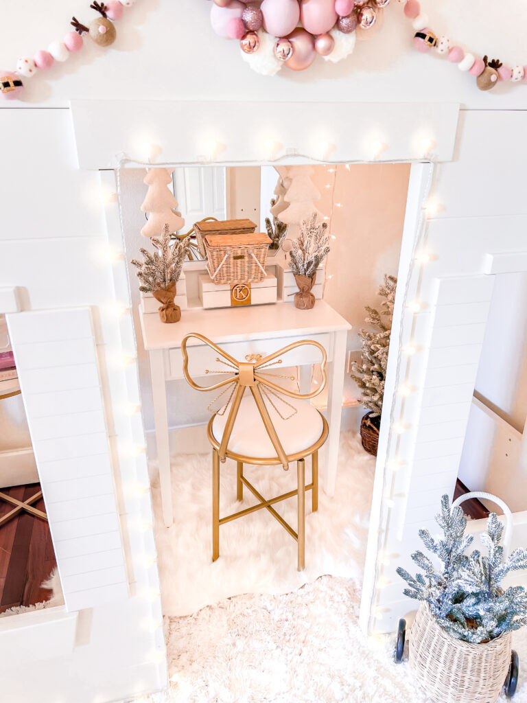 Pink Christmas Decor little girl Christmas bedroom Katelyn Jones A Touch of Pink white vanity with metal gold bow chair  Pottery Barn Loft Bed