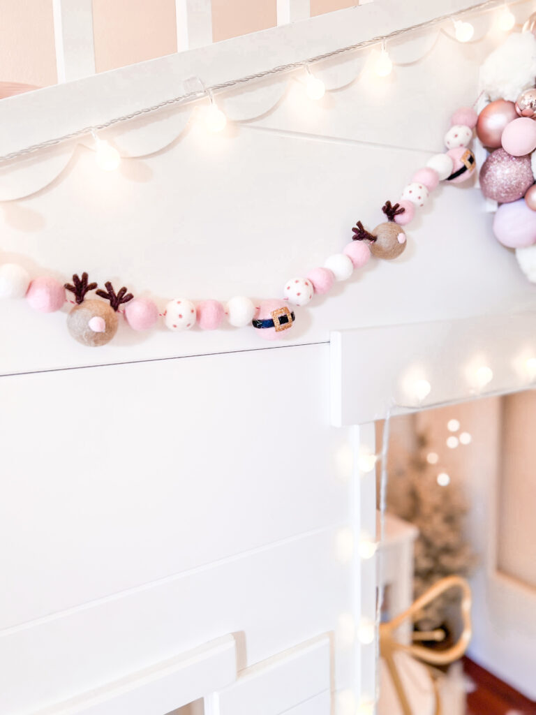 Pink Christmas Decor little girl Christmas bedroom Katelyn Jones A Touch of Pink Blog Pink Santa Pearl and Jane Felt Pom Pom Garland