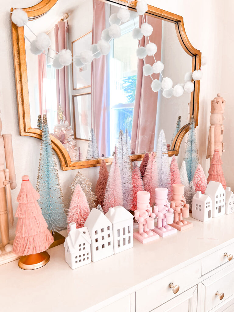 Pink Christmas Decor little girl Christmas bedroom Katelyn Jones A Touch of Pink Blog Pink Nutcrackers Bottle Brush Trees Christmas Dresser